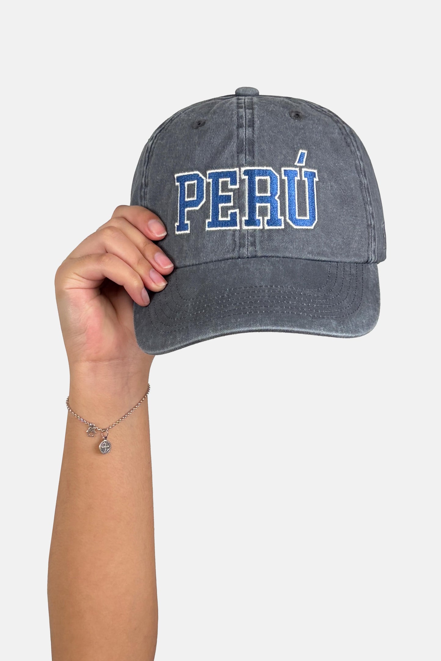 Gorro Perú acero hueso