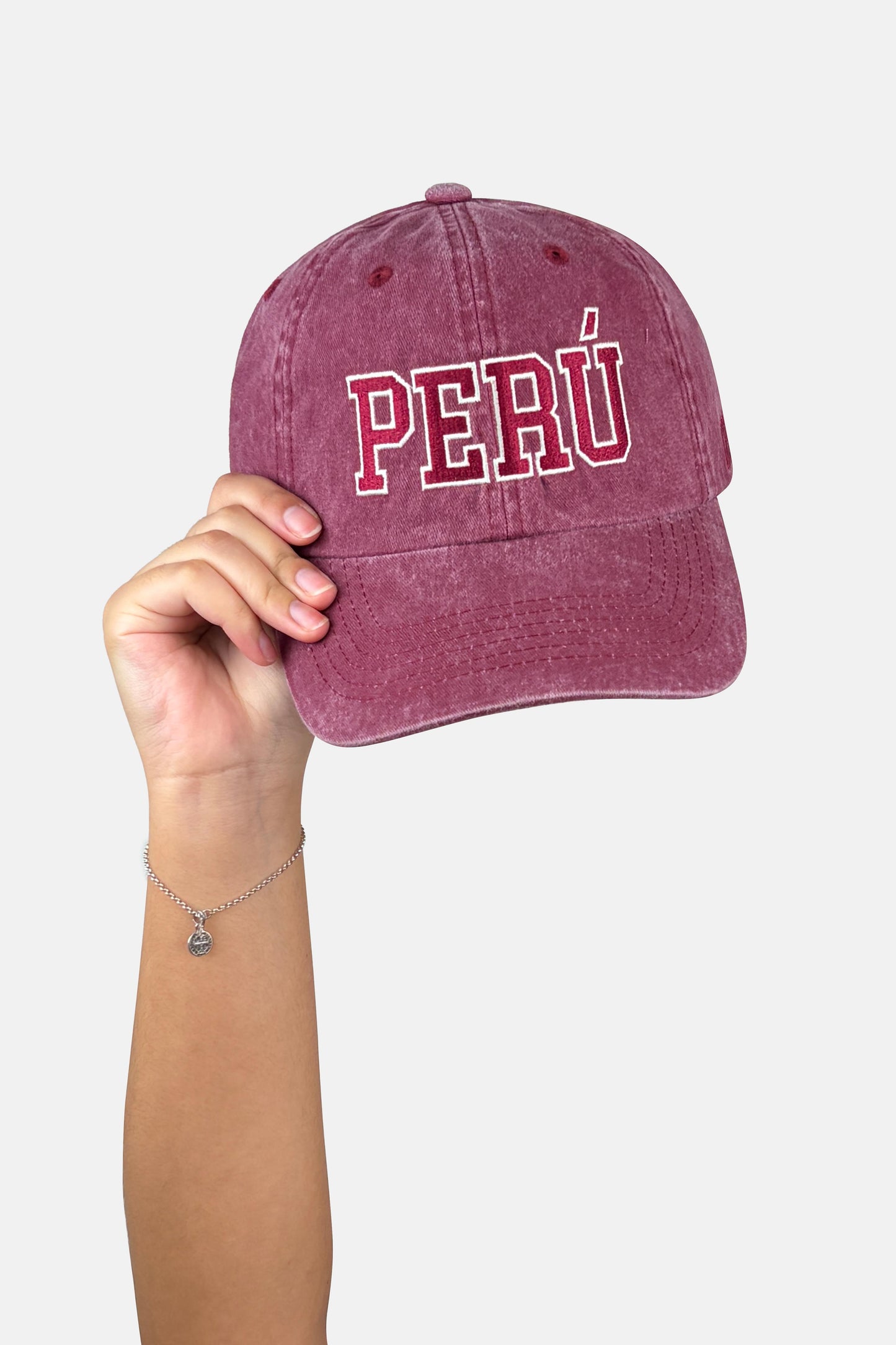 Gorro Perú guinda hueso