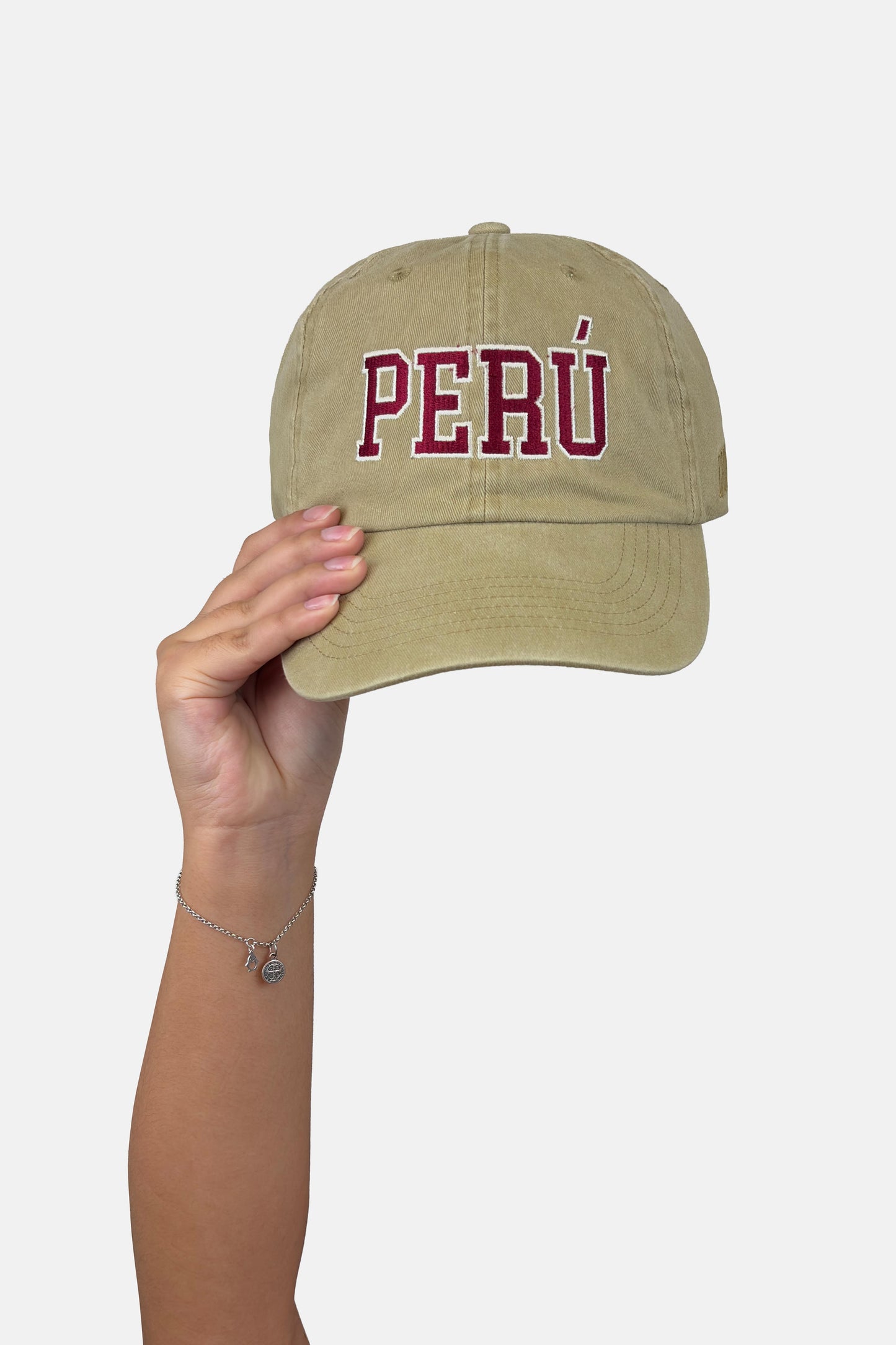 Gorro Perú guinda hueso